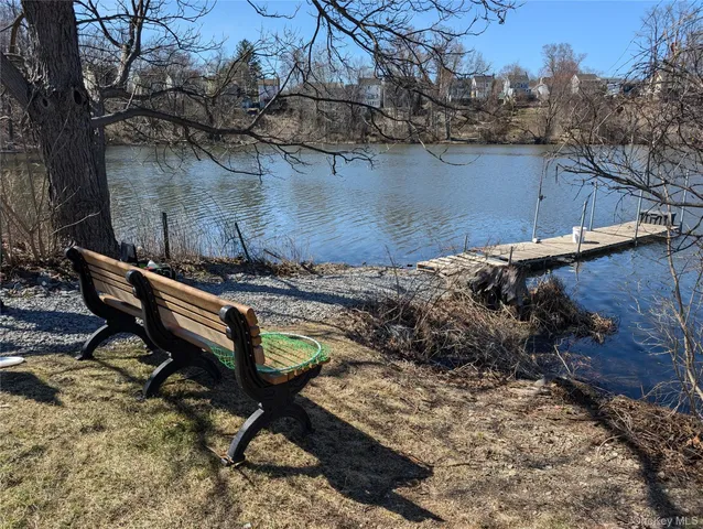 a backyard of a house with lots of trees