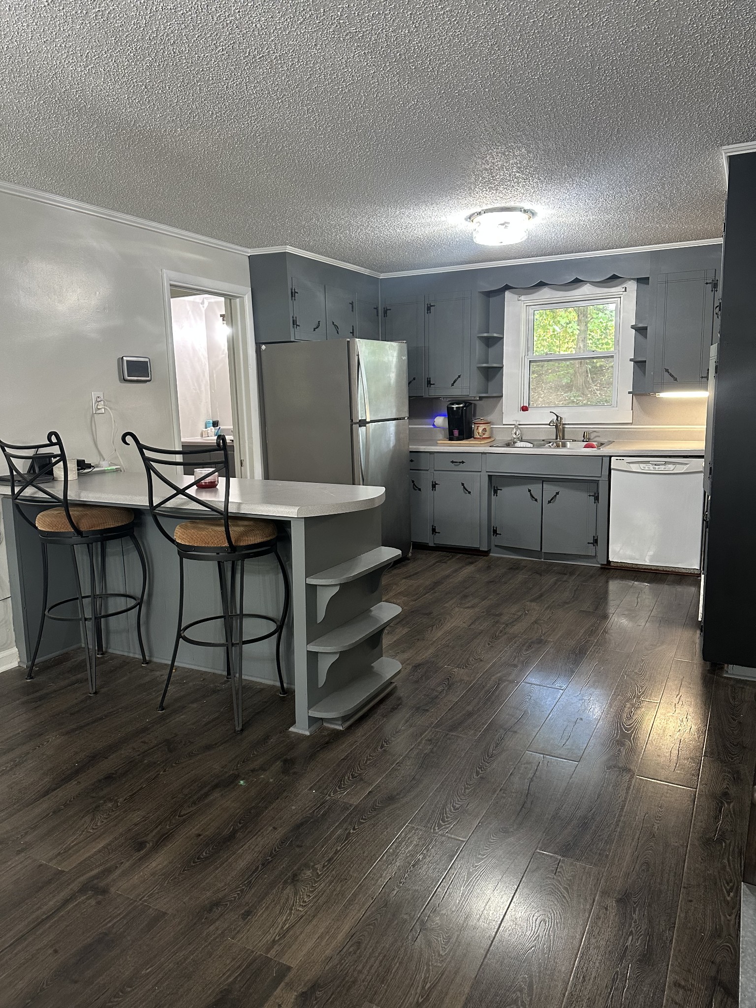 16 Cummings Road Summertown, TN 38483 - Photo 22 of 33 a living room with furniture and a wooden floor