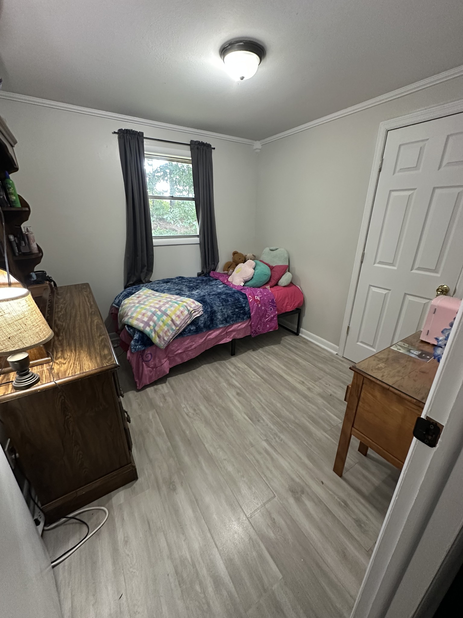 16 Cummings Road Summertown, TN 38483 - Photo 27 of 33 a bedroom with bed and a window