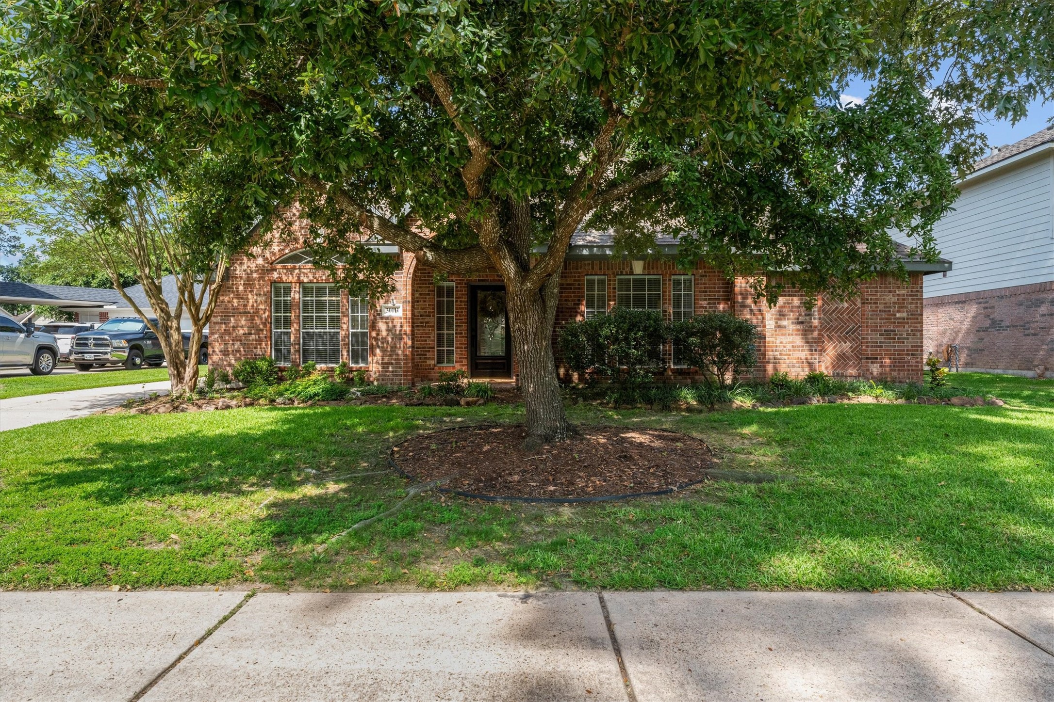 30111 Granum Drive Spring, TX 77386 - Photo 4 of 45 a view of a yard with plants and trees