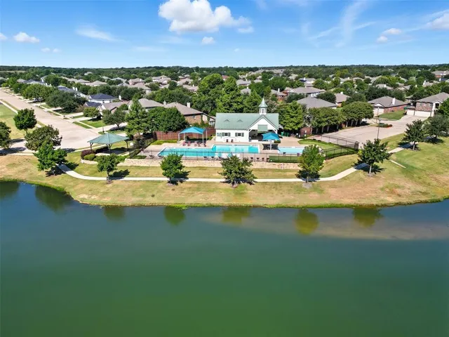a view of a lake with a city