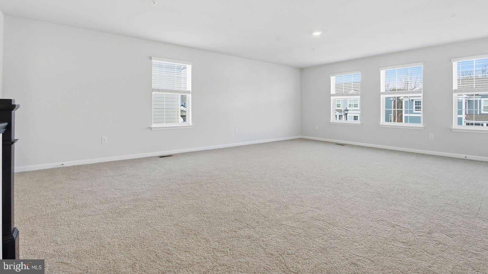 8110 Cypress Pt Drive Rosedale, MD 21237 - Photo 27 of 37 an empty room with windows