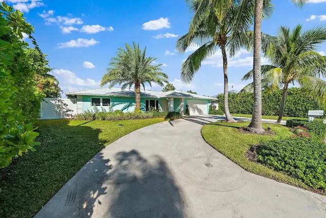 a view of a swimming pool with a garden