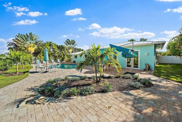 a view of a street with a house
