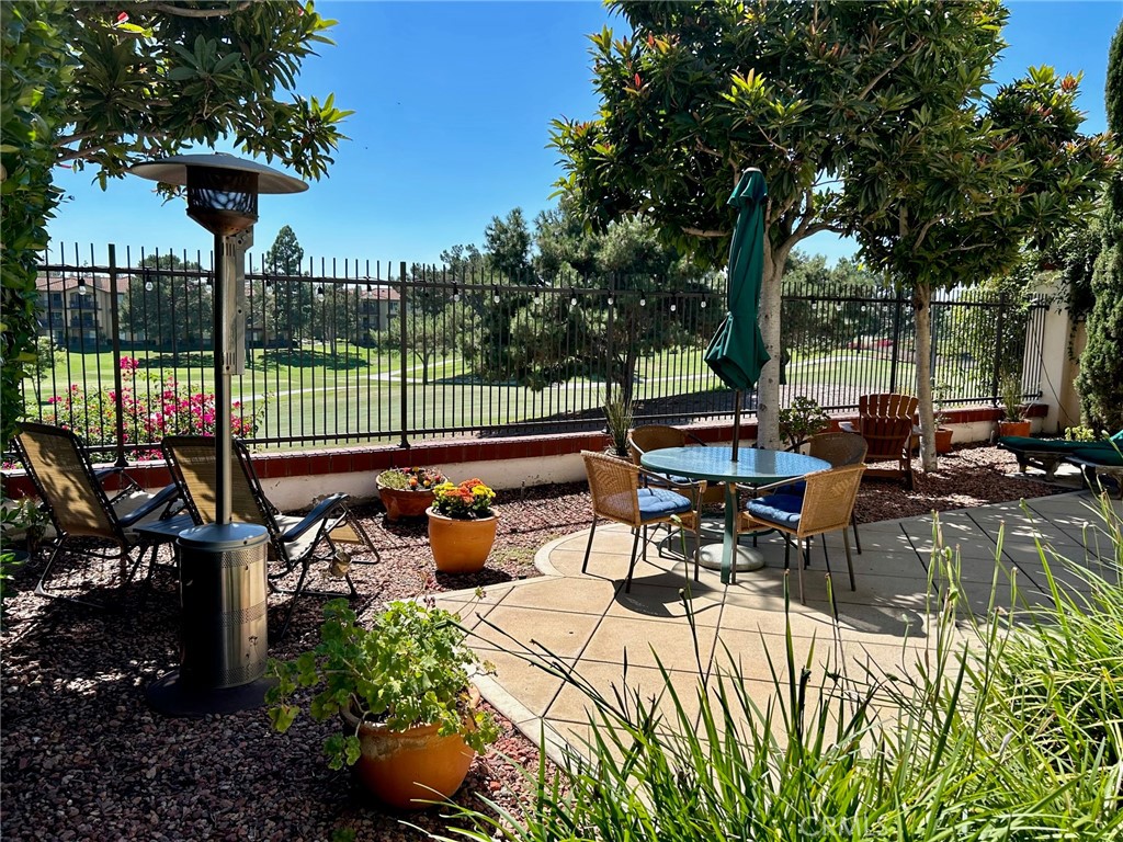 2811 Caponi Place Tustin, CA 92782 - Photo 11 of 50 a view of a patio with couches chairs and a potted plants