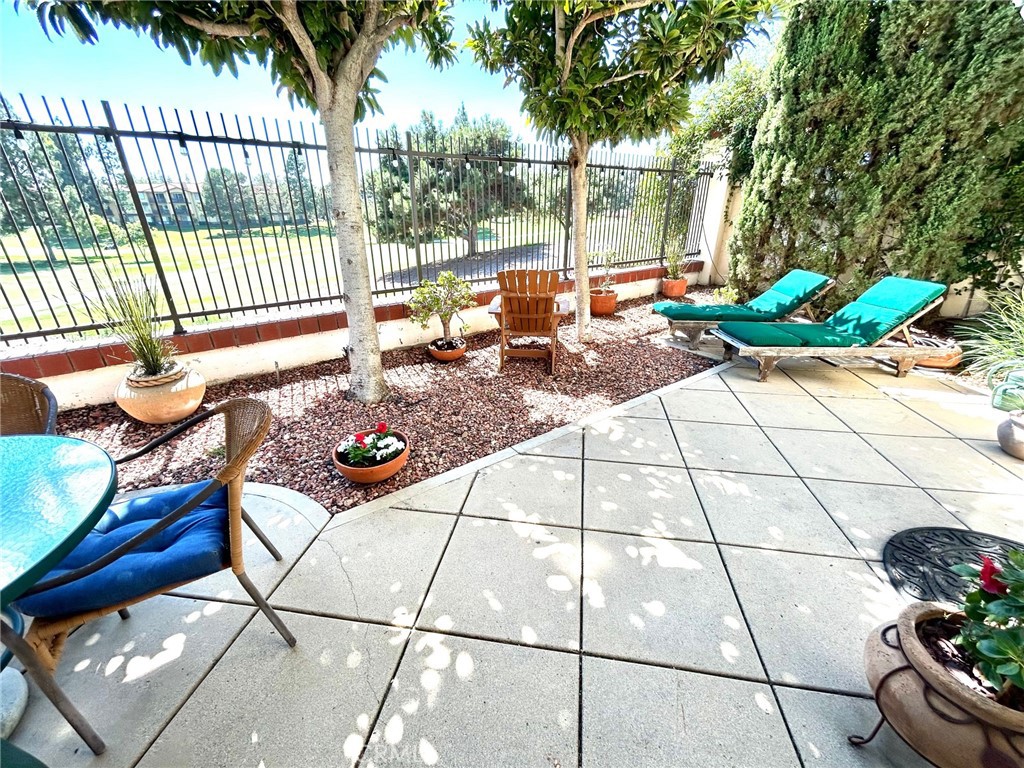 2811 Caponi Place Tustin, CA 92782 - Photo 12 of 50 a outdoor space with lots of white furniture