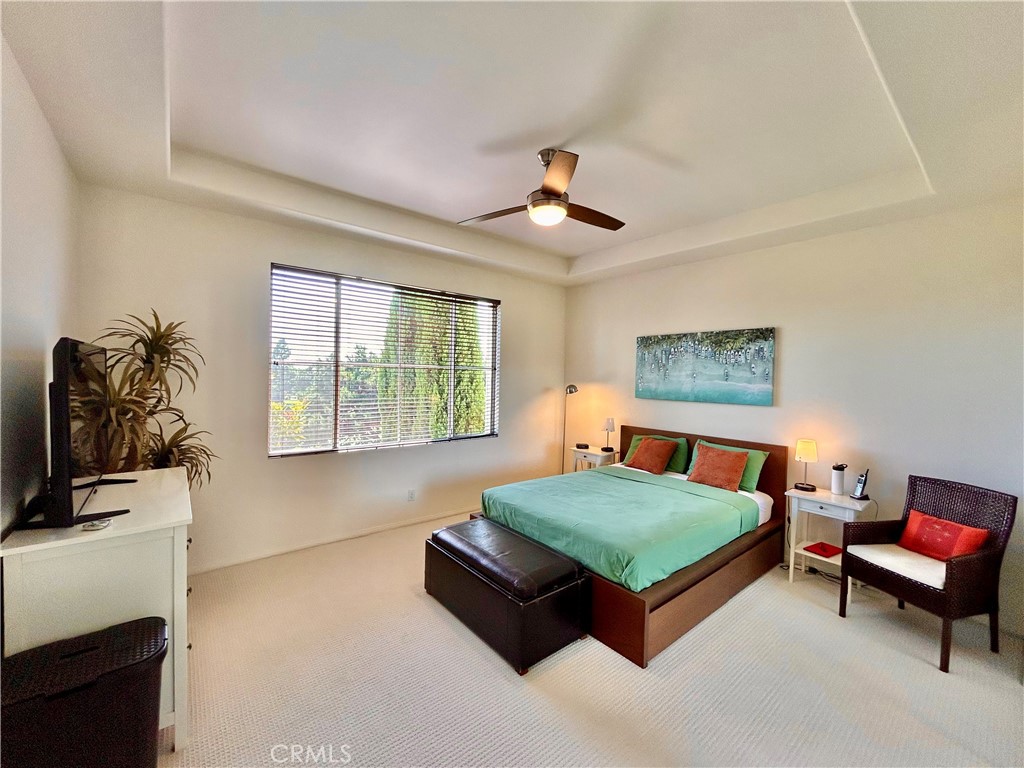 2811 Caponi Place Tustin, CA 92782 - Photo 19 of 50 a living room with furniture and a flat screen tv