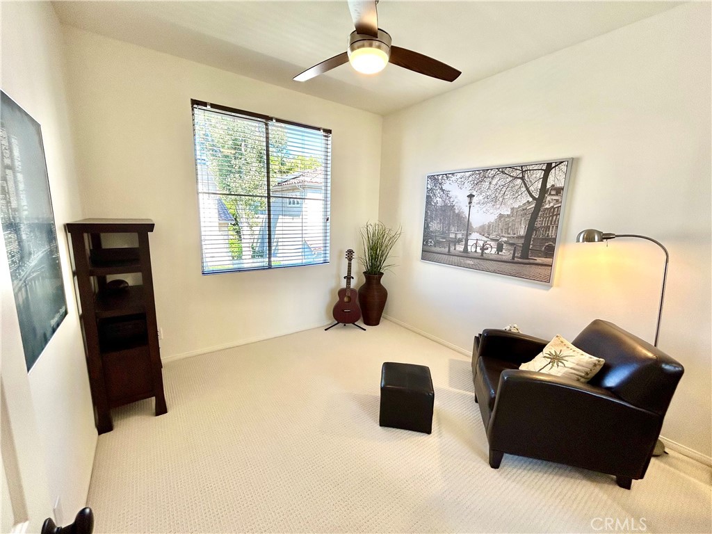 2811 Caponi Place Tustin, CA 92782 - Photo 23 of 50 a living room with furniture and a window