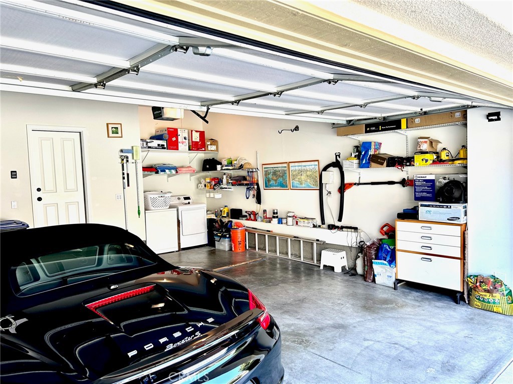 2811 Caponi Place Tustin, CA 92782 - Photo 25 of 50 a room with lots of furniture and clutter