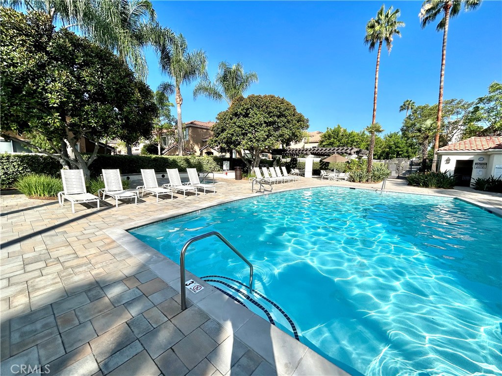 2811 Caponi Place Tustin, CA 92782 - Photo 29 of 50 a view of a swimming pool with a patio
