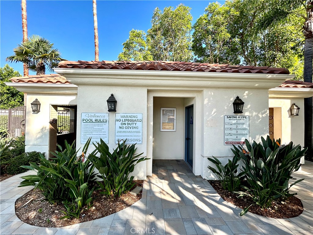 2811 Caponi Place Tustin, CA 92782 - Photo 31 of 50 a front view of a house with potted plants