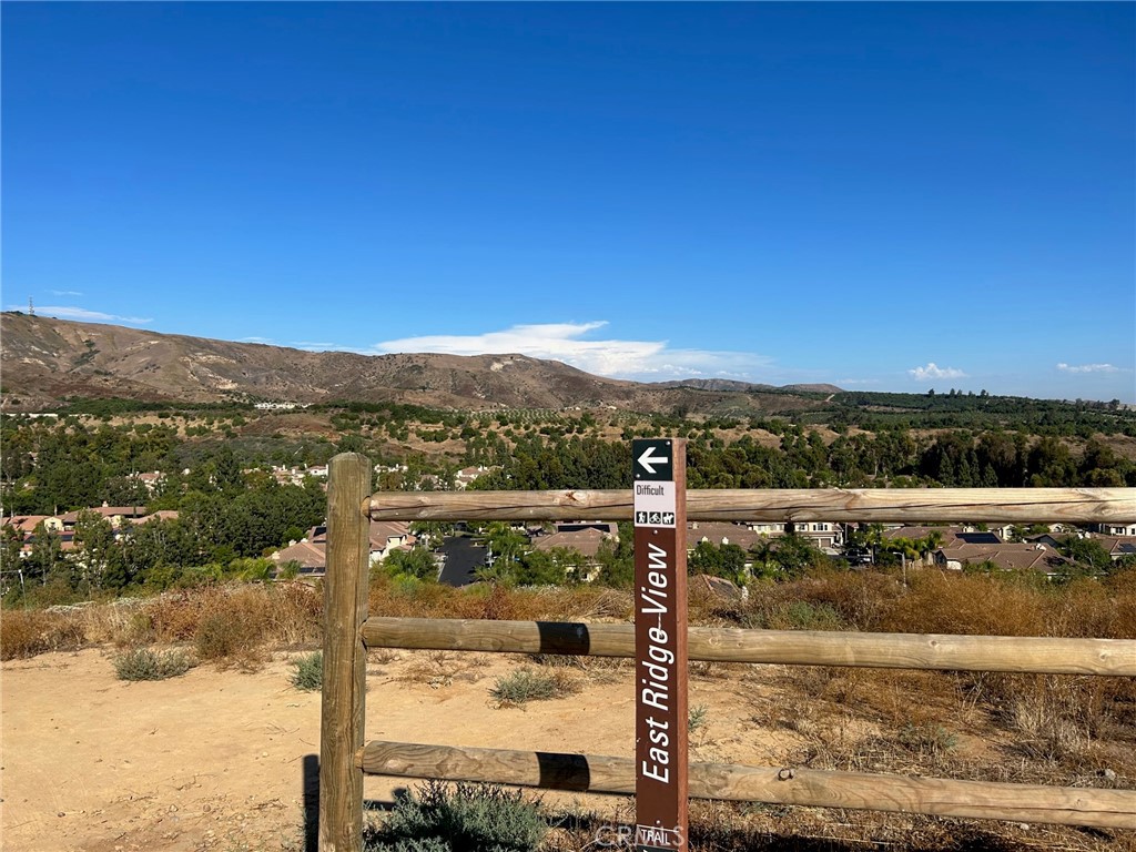 2811 Caponi Place Tustin, CA 92782 - Photo 38 of 50 a view of a lake with a mountain in the background