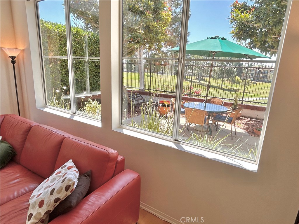 2811 Caponi Place Tustin, CA 92782 - Photo 4 of 50 a blue couch sitting in front of a window