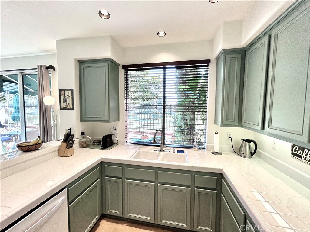 2811 Caponi Place Tustin, CA 92782 - Photo 6 of 50 a bathroom with a sink and a window