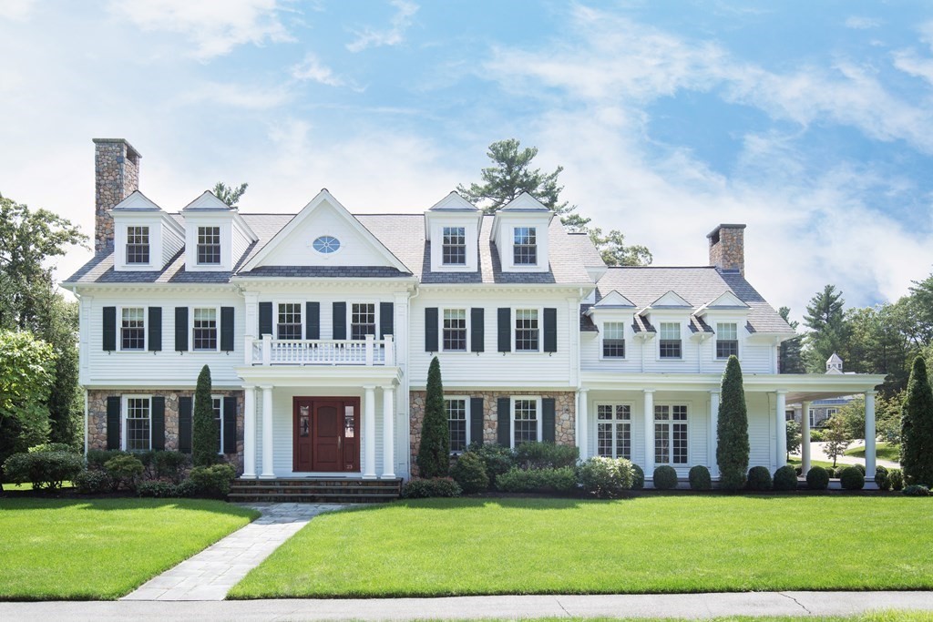 23 Pembroke Road Wellesley, MA 02482 - Photo 1 of 16 a front view of a house with a yard
