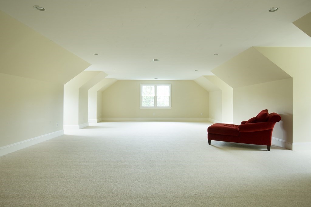 23 Pembroke Road Wellesley, MA 02482 - Photo 15 of 16 a room with furniture and a window