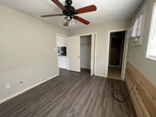 4119 32nd Street, Unit REAR Lubbock, TX 79410 - Photo 6 of 9 a view of entryway with wooden floor