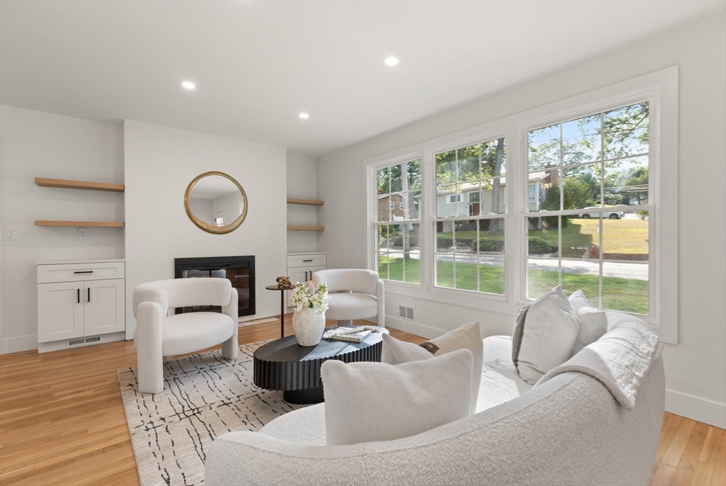 77 Morton Street Canton, MA 02021 - Photo 11 of 28 a living room with furniture and a large window