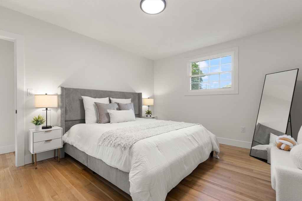 77 Morton Street Canton, MA 02021 - Photo 12 of 28 a bedroom with a bed and a window