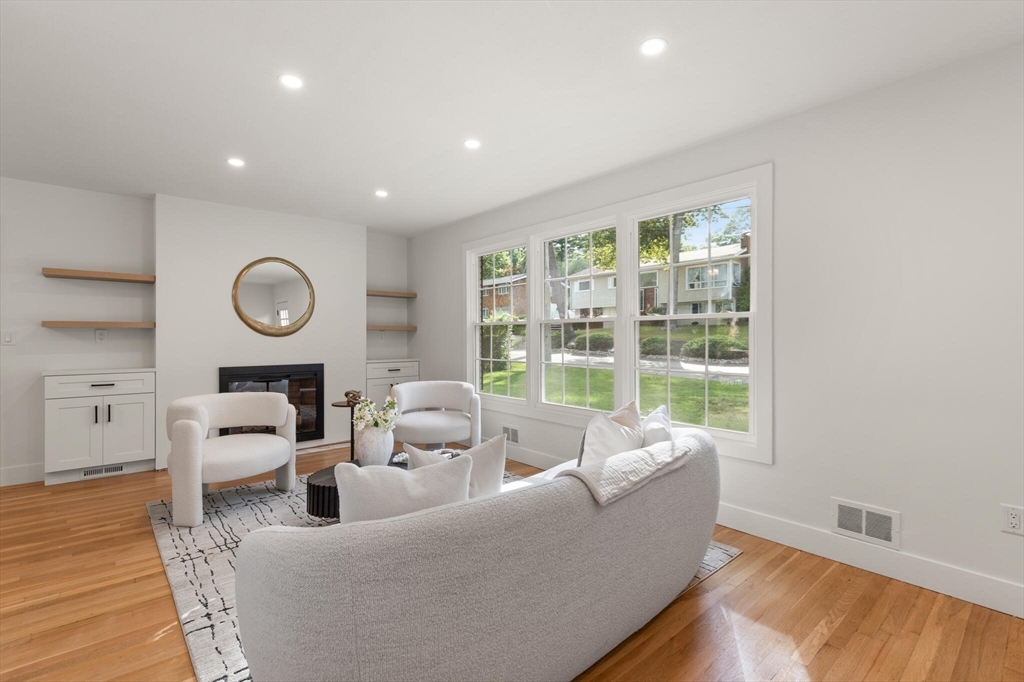 77 Morton Street Canton, MA 02021 - Photo 2 of 28 a living room with furniture and a large window