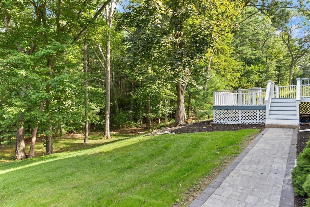 77 Morton Street Canton, MA 02021 - Photo 25 of 28 front view of a house with a yard