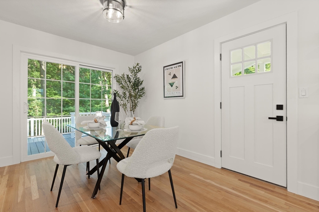 77 Morton Street Canton, MA 02021 - Photo 7 of 28 a view of a dining room with furniture window and wooden floor
