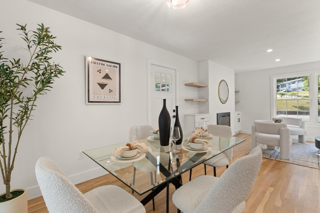 77 Morton Street Canton, MA 02021 - Photo 8 of 28 a view of a dining room with furniture and wooden floor