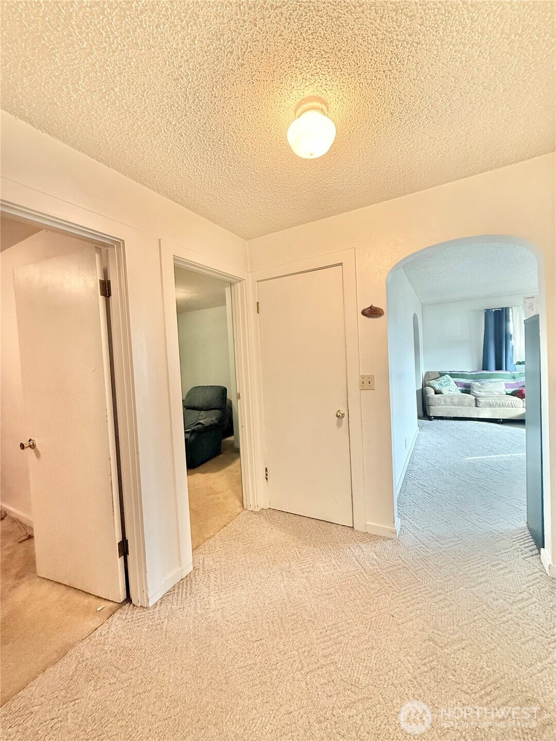 965 3rd Avenue North Okanogan, WA 98840 - Photo 19 of 26 a view of a livingroom with wooden floor and a cabinet