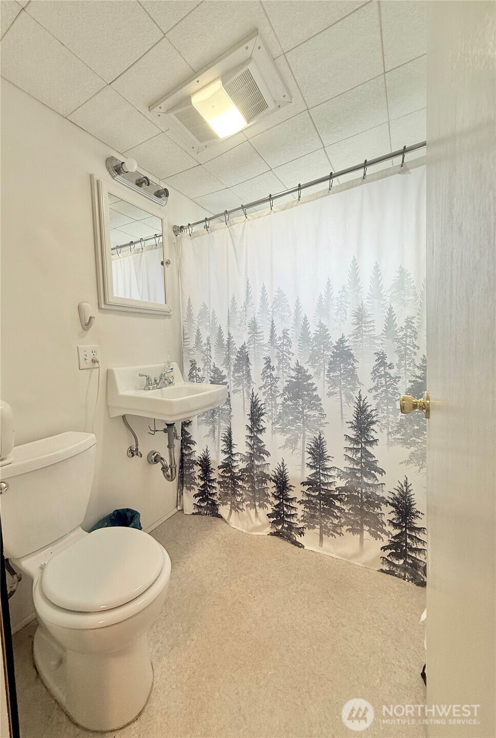 965 3rd Avenue North Okanogan, WA 98840 - Photo 21 of 26 a bathroom with a toilet sink and shower