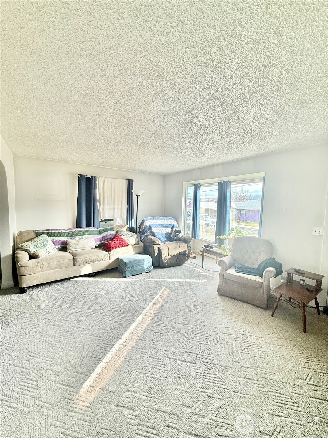 965 3rd Avenue North Okanogan, WA 98840 - Photo 9 of 26 a living room with furniture and a couch