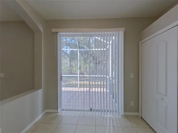 a view of a room that has a sliding door