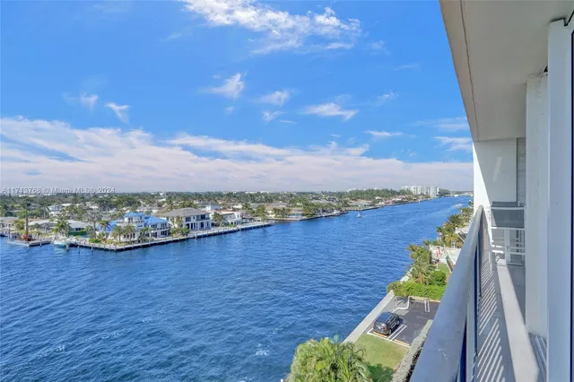 a bedroom with a bed and a table