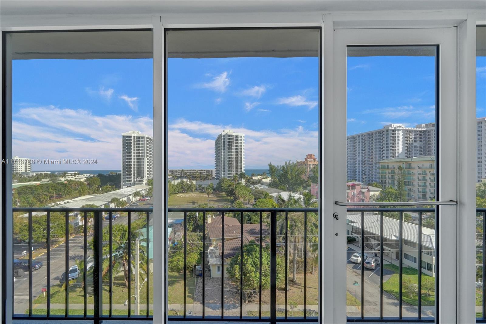 521 North Riverside Drive, Unit 705 Pompano Beach, FL 33062 - Photo 42 of 55 a view of a city from a porch