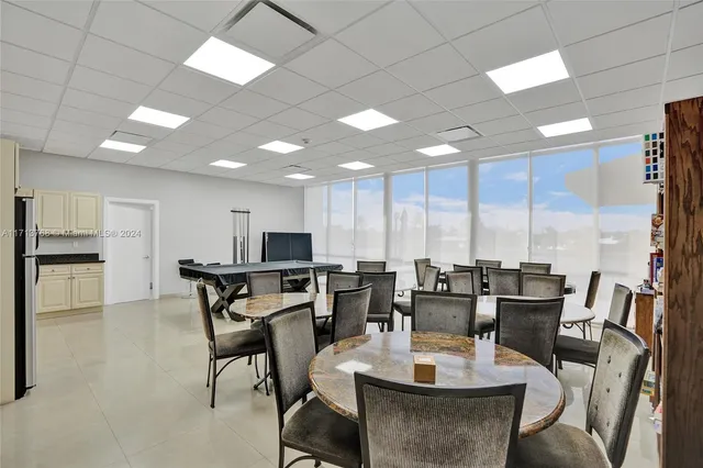 a house with swimming pool in front of it