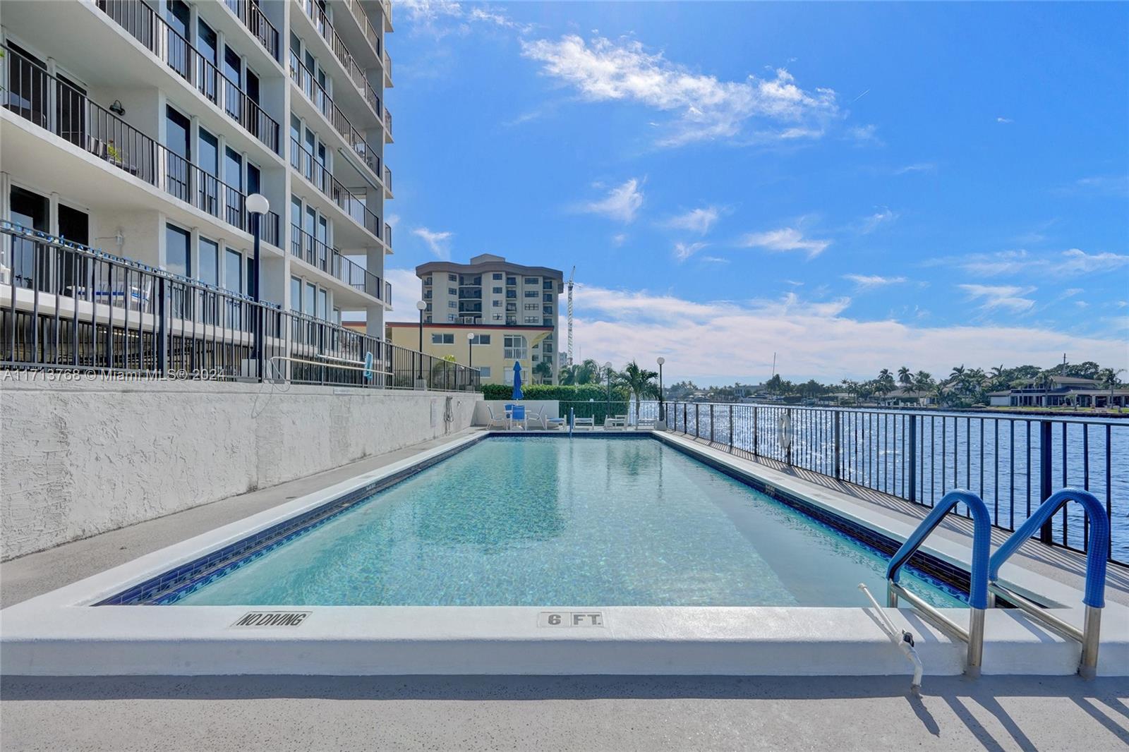 521 North Riverside Drive, Unit 705 Pompano Beach, FL 33062 - Photo 50 of 55 a view of swimming pool from a balcony