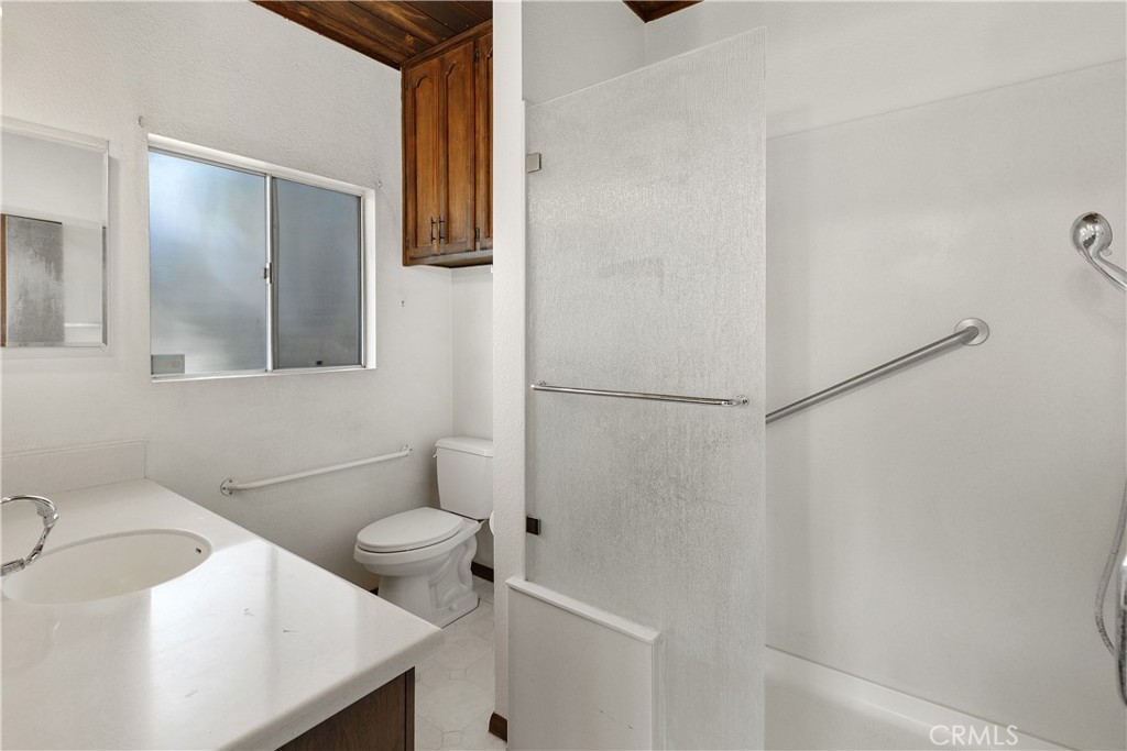 3892 Oakwood Place Riverside, CA 92506 - Photo 18 of 36 The downstairs bathroom is attached to bedroom #1
