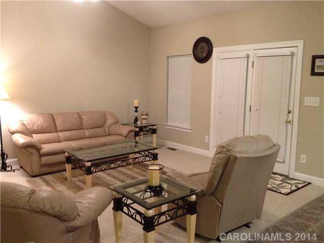 1722 Fletcher Broome Road Monroe, NC 28112 - Photo 3 of 15 a living room with furniture and a window