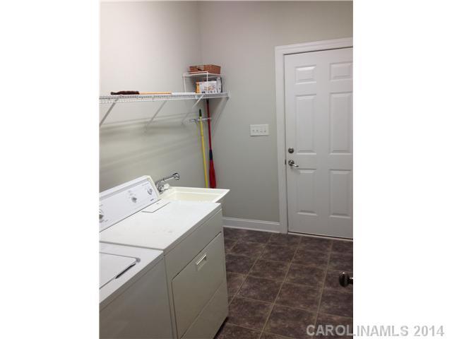 1722 Fletcher Broome Road Monroe, NC 28112 - Photo 4 of 15 a bathroom with a sink and mirror