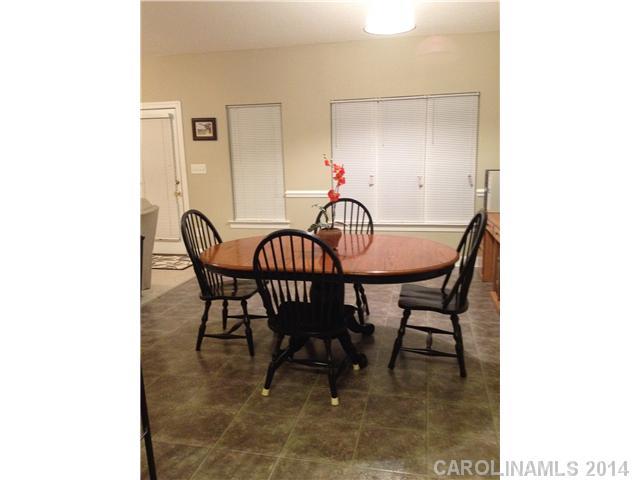 1722 Fletcher Broome Road Monroe, NC 28112 - Photo 8 of 15 a view of a dining room with furniture