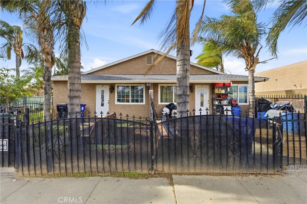 610 South Olive Avenue Rialto, CA 92376 - Photo 2 of 44 a front view of house yard and outdoor space