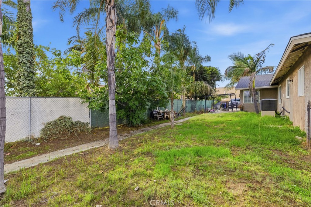 610 South Olive Avenue Rialto, CA 92376 - Photo 27 of 44 a view of backyard of house with green space