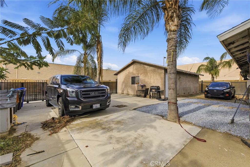 610 South Olive Avenue Rialto, CA 92376 - Photo 29 of 44 a car parked in front of a house