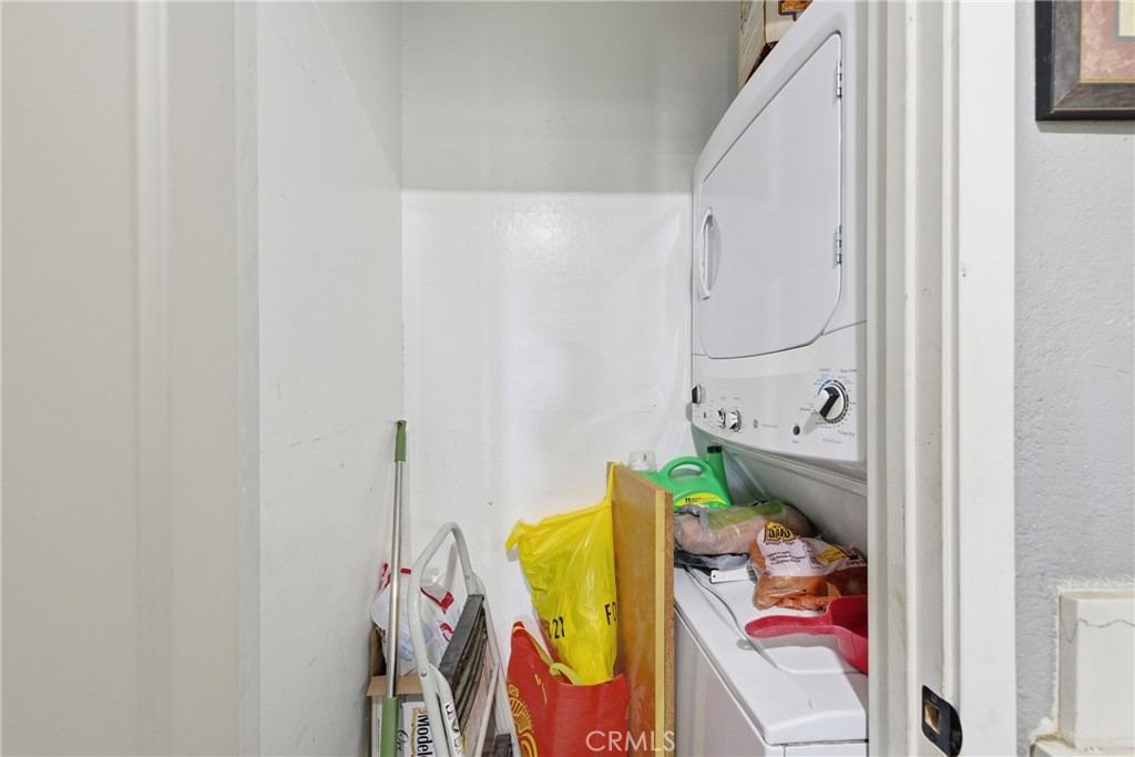 610 South Olive Avenue Rialto, CA 92376 - Photo 9 of 44 a bathroom with a sink mirror and vanity