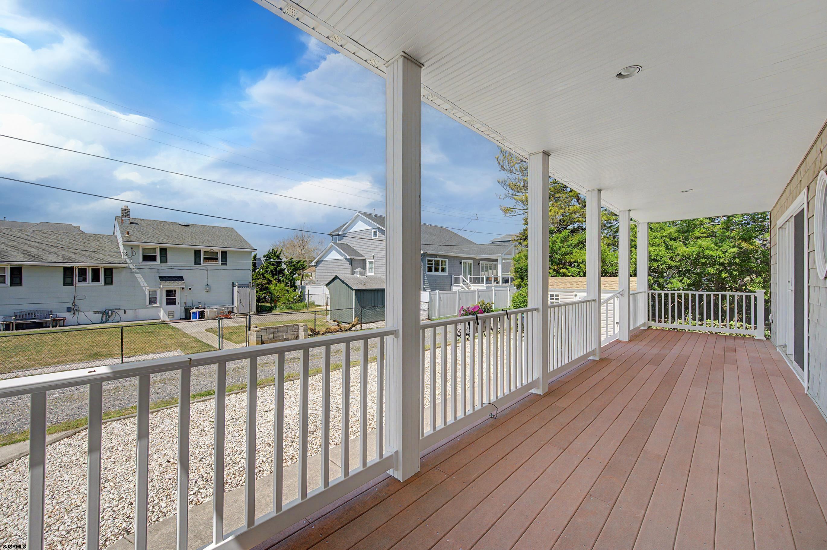 212 17th Street South Brigantine, NJ 08203 - Photo 32 of 37 a view of a balcony with wooden floor