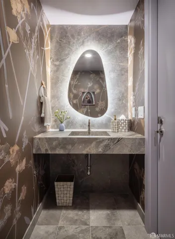 a closeup of a sink and a mirror