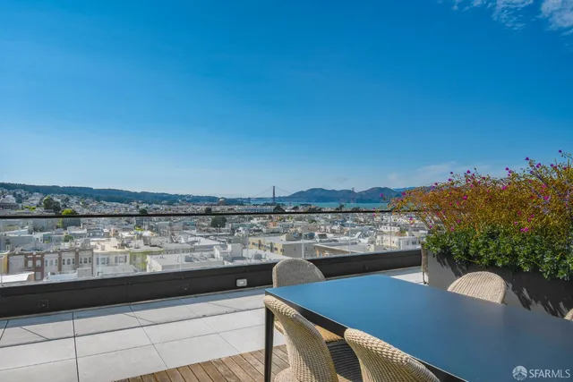 a view of a balcony with an ocean view