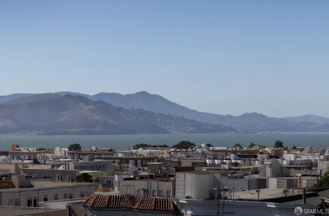 a view of city and mountain