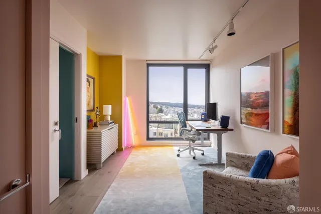 a living room with furniture and a table