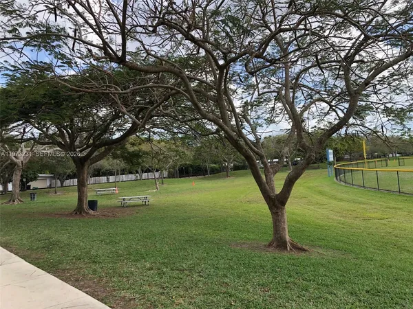 a view of a house with sitting area and roof