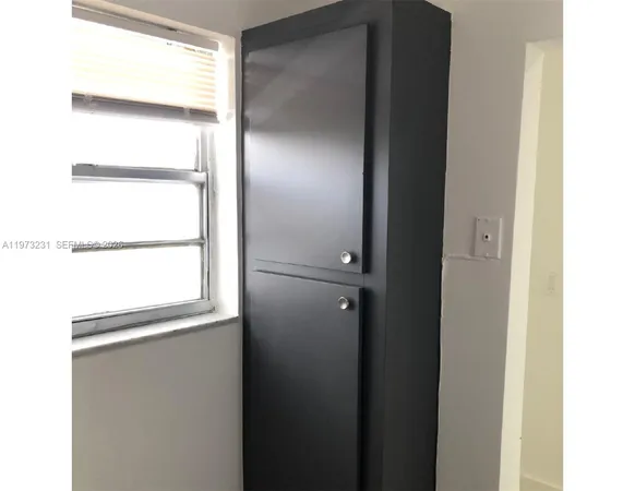 a bathroom with a toilet sink and bathtub